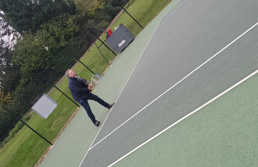 Julian Playing Tennis