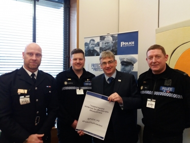 Julian Knight MP with police.